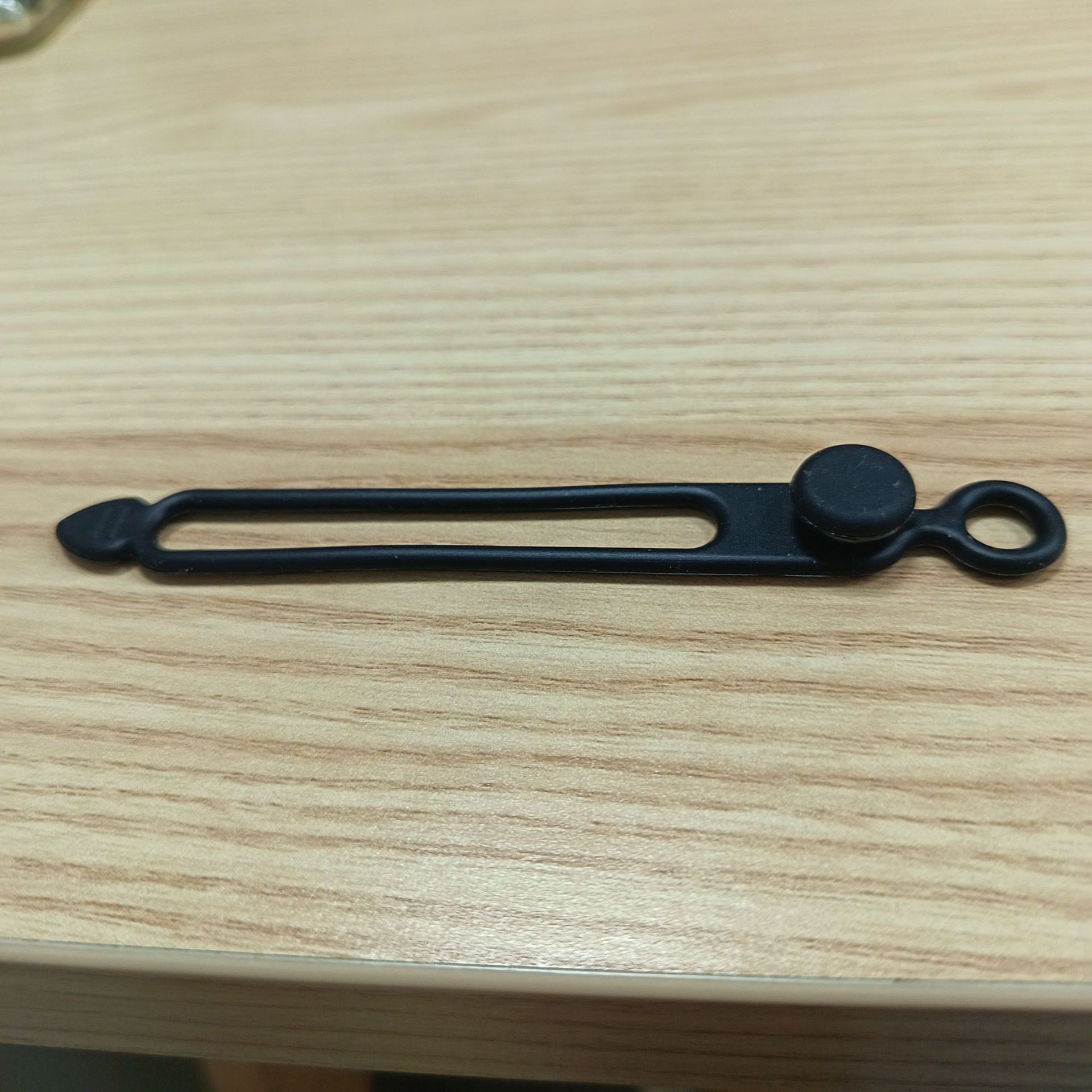 El cable de datos contiene la correa de silicona del gestor de la línea de carga del cable de auriculares del bobinador de la correa de silicona.