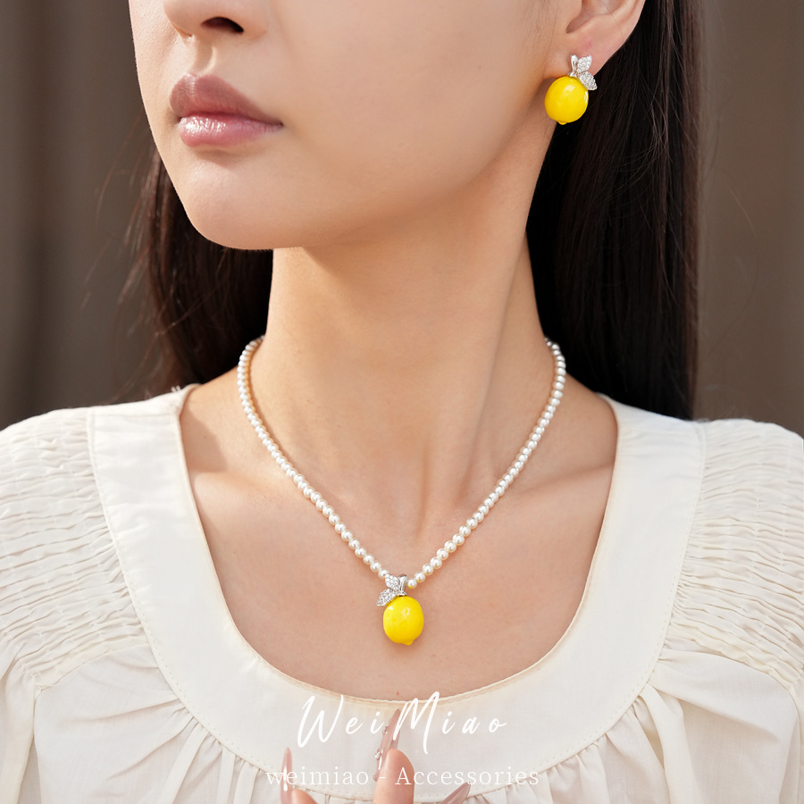 Collar de limón de resina de limón con cuentas redondas lujo ligero nicho cadenas de clavícula temperamento personalidad conjunto de joyas de moda