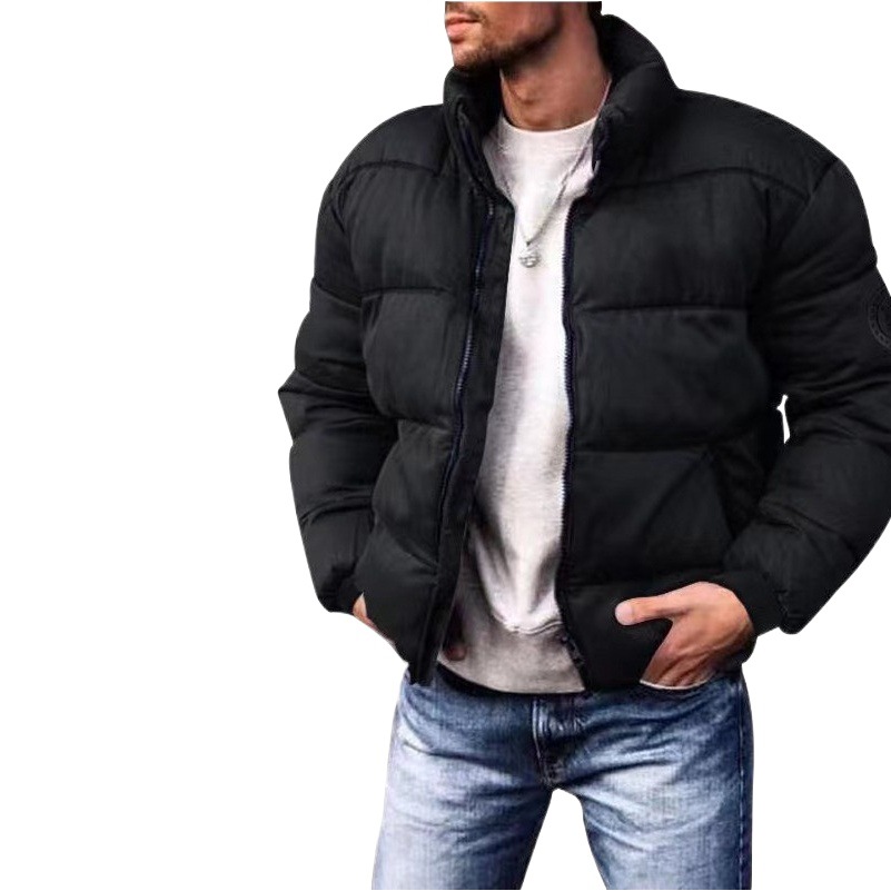 Chaqueta acolchada de algodón de invierno para hombres nuevos transfronterizos Abrigo acolchado de algodón con cuello de pie simple Chaqueta acolchada de algodón imprimible de color sólido engrosada