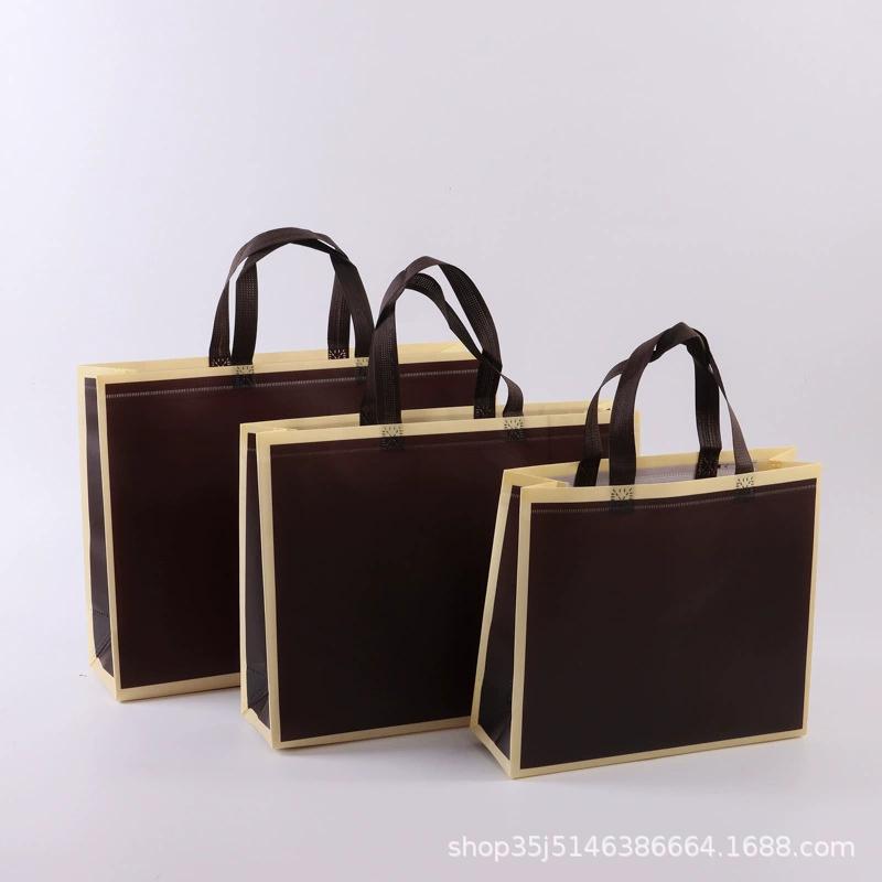 Bolso no tejido recubierto en stock impreso LOGO bolsa de ropa de moda embalaje de regalo bolsa de Banco de costura impresa