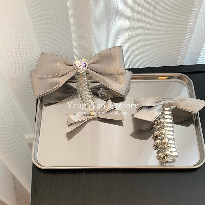 ¡Insfeng Silver es un artefacto mágico de tejido de cabello de la parte de la mano! Cabezas de cabello trenzadas de arco de cabello de cable telefónico