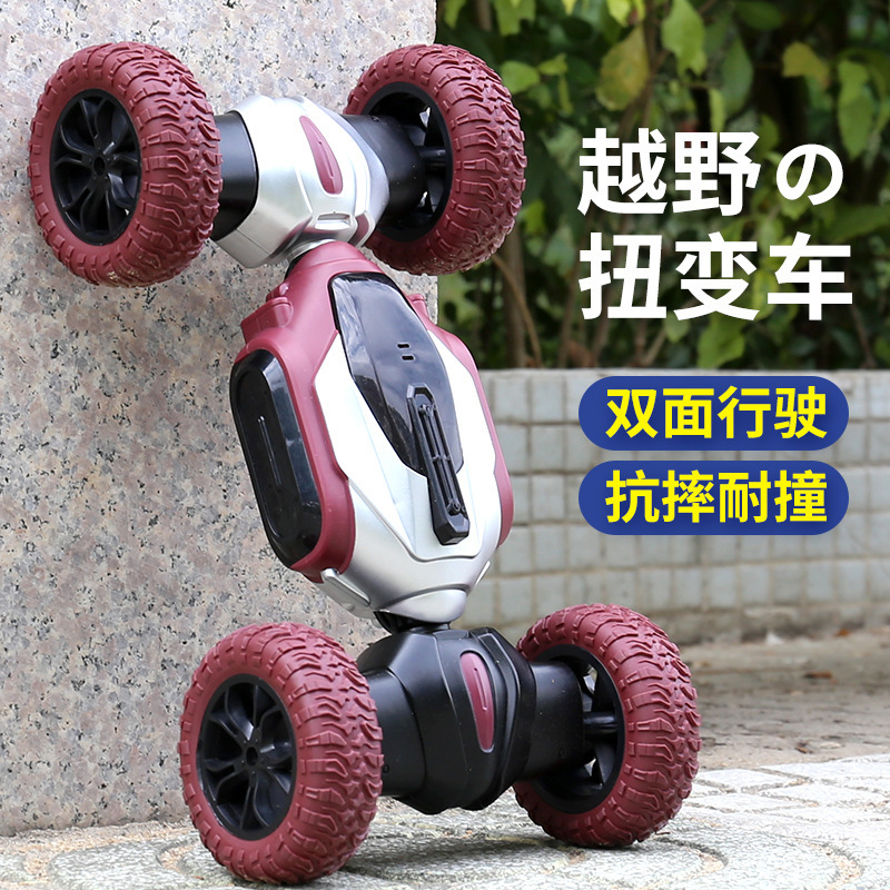 Transfronterizo coche de juguete controlado remotamente para niños acrobacias de deriva vehículo todoterreno cuatro ruedas vehículo de escalada bidireccional 2.4G coche de torsión de música