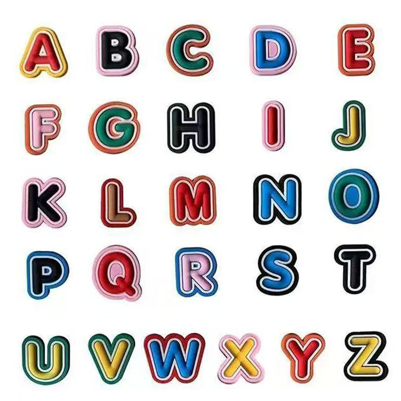 Cross-border hot color 26 letters hole shoes shoes flower hole shoes accessories in stock quick hair can be selected