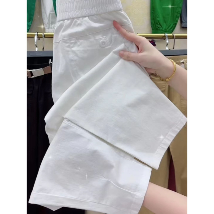 ヨーロッパの商品の夏の薄いタイプの9分のズボンの女性の新型の高弾性の綿のゆったりしている腰のハーレムのズボンの百合はやせているおばあさんのズボンを現します。|undefined