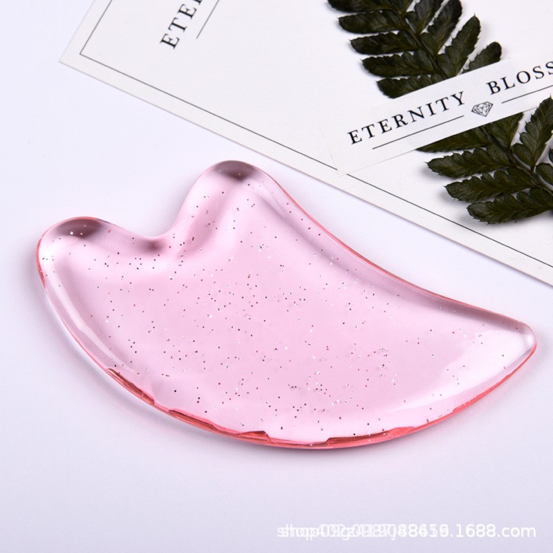 Heart Shaped Gua Sha Facial Massage Board 11.5 x 6.8 cm Black Scraping Tool for Face Lifting and Relaxation in use