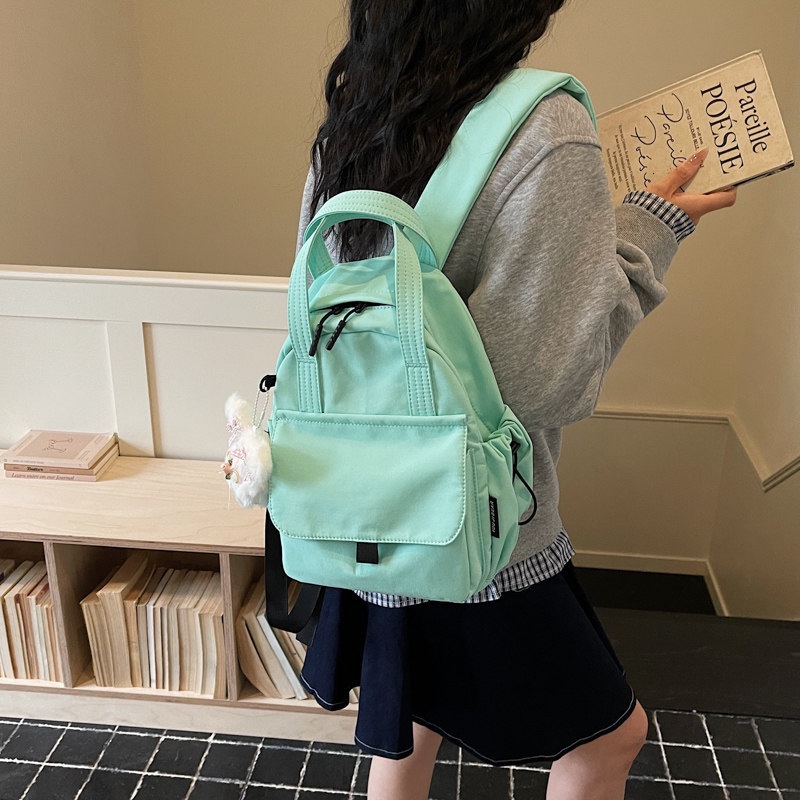 Mochila diaria nueva moda casual versátil marea de hombro femenino viaje ligero estudiantes de clase 2026