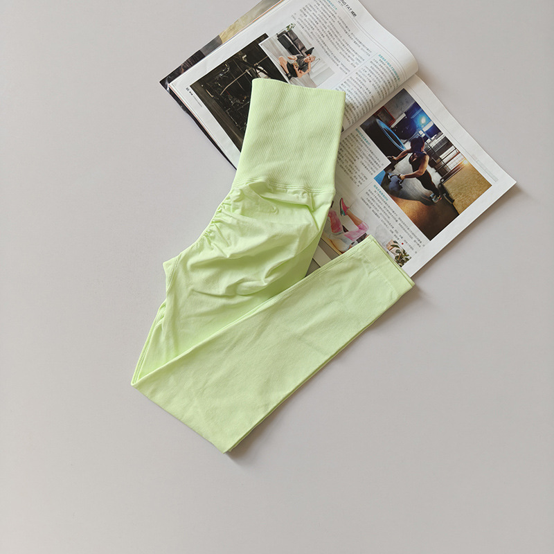 Pantalones de gimnasio sin costura europeos y estadounidenses, cintura alta, abdomen, caderas, pantalones de melocotón para correr, yoga, leggings apretadas