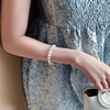 Bracelet from pearl, protective amulet, brand buckle, simple and elegant design