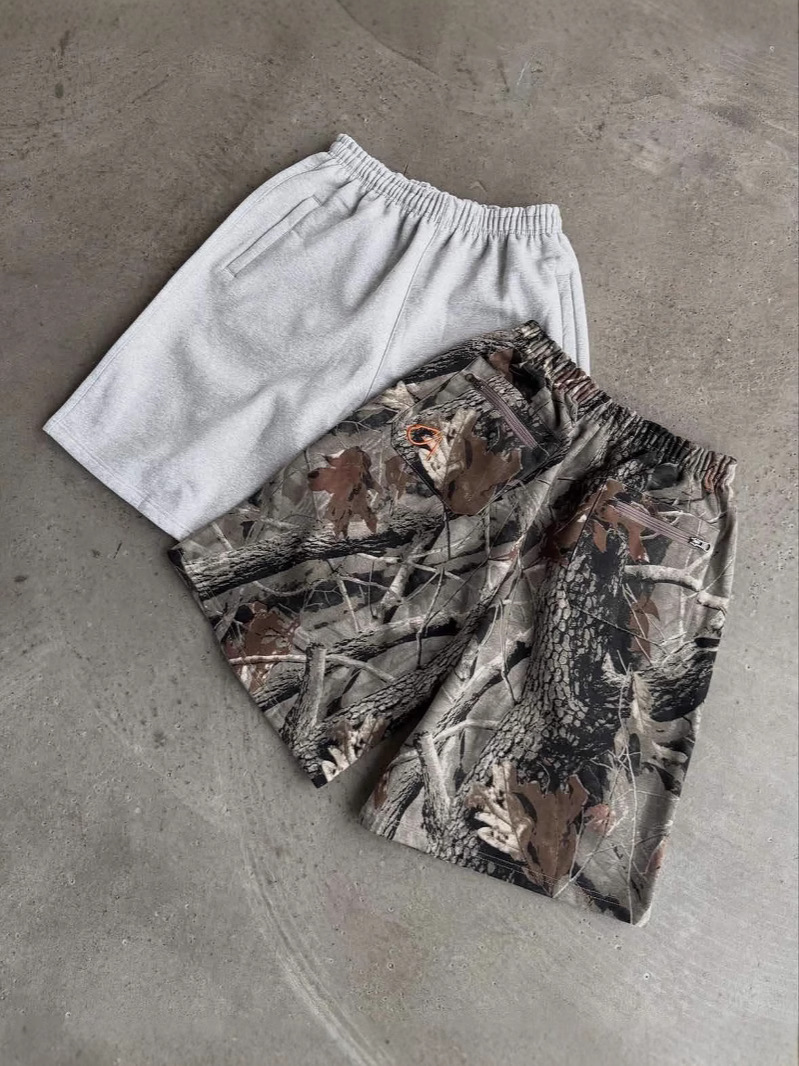 American Retro Europa y Estados Unidos Calle transfronteriza hip-hop verano bordado pantalones cortos sueltos casuales de moda pantalones cortos hombres