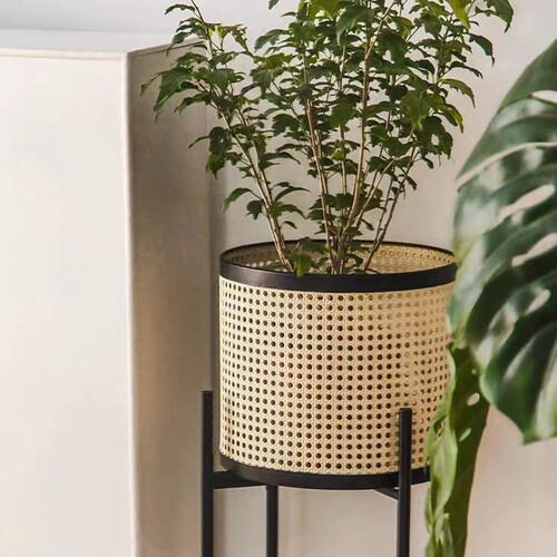 Modern light luxury minimalist Japanese style living room balcony indoor iron plant stand with rattan-like woven frame