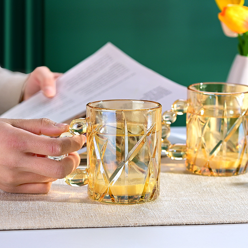 Taza de vidrio de perlas para engrosar taza de café doméstica de alto valor facial taza de leche de jugo fábrica de taza de agua al por mayor