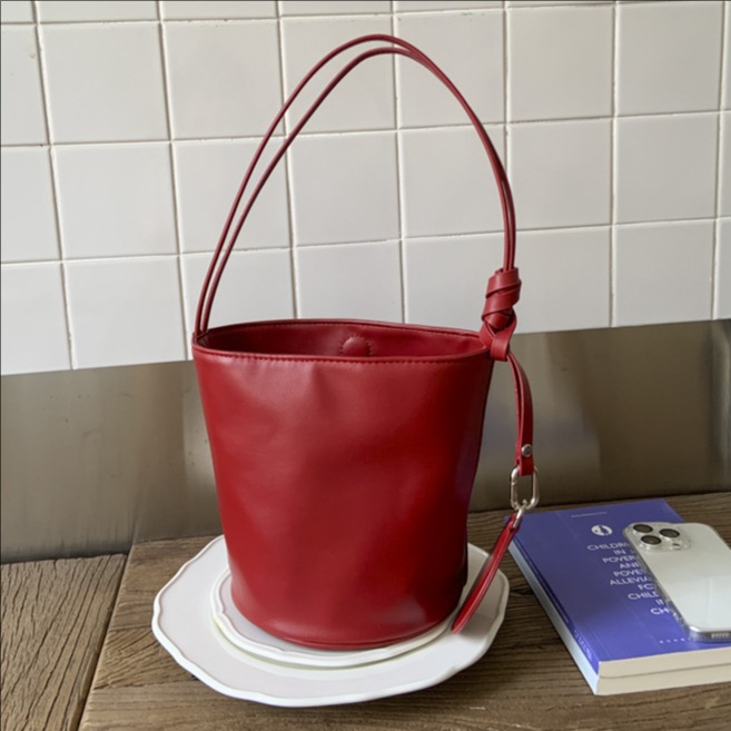 2025 nuevo bolso de mujer simple bolso de axila casual bolso de cubo de gran capacidad para mujer bolso de hombro de alta gama de moda