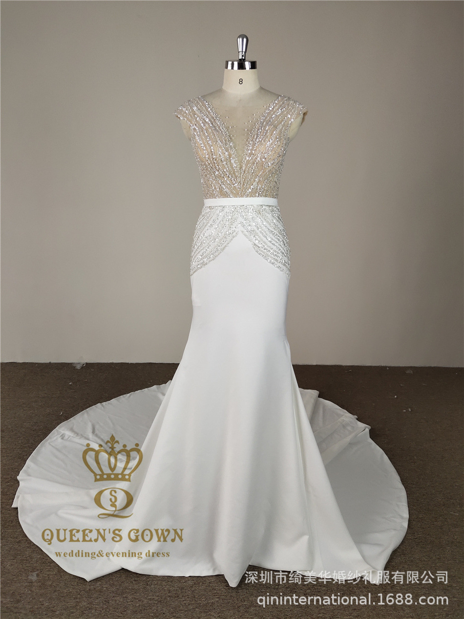Long elegant beige wedding dress sleevless