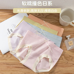 Japanese seamless girl's underwear wholesale invisible plain color bow middle waist pure cotton antibacterial gusset triangle pants