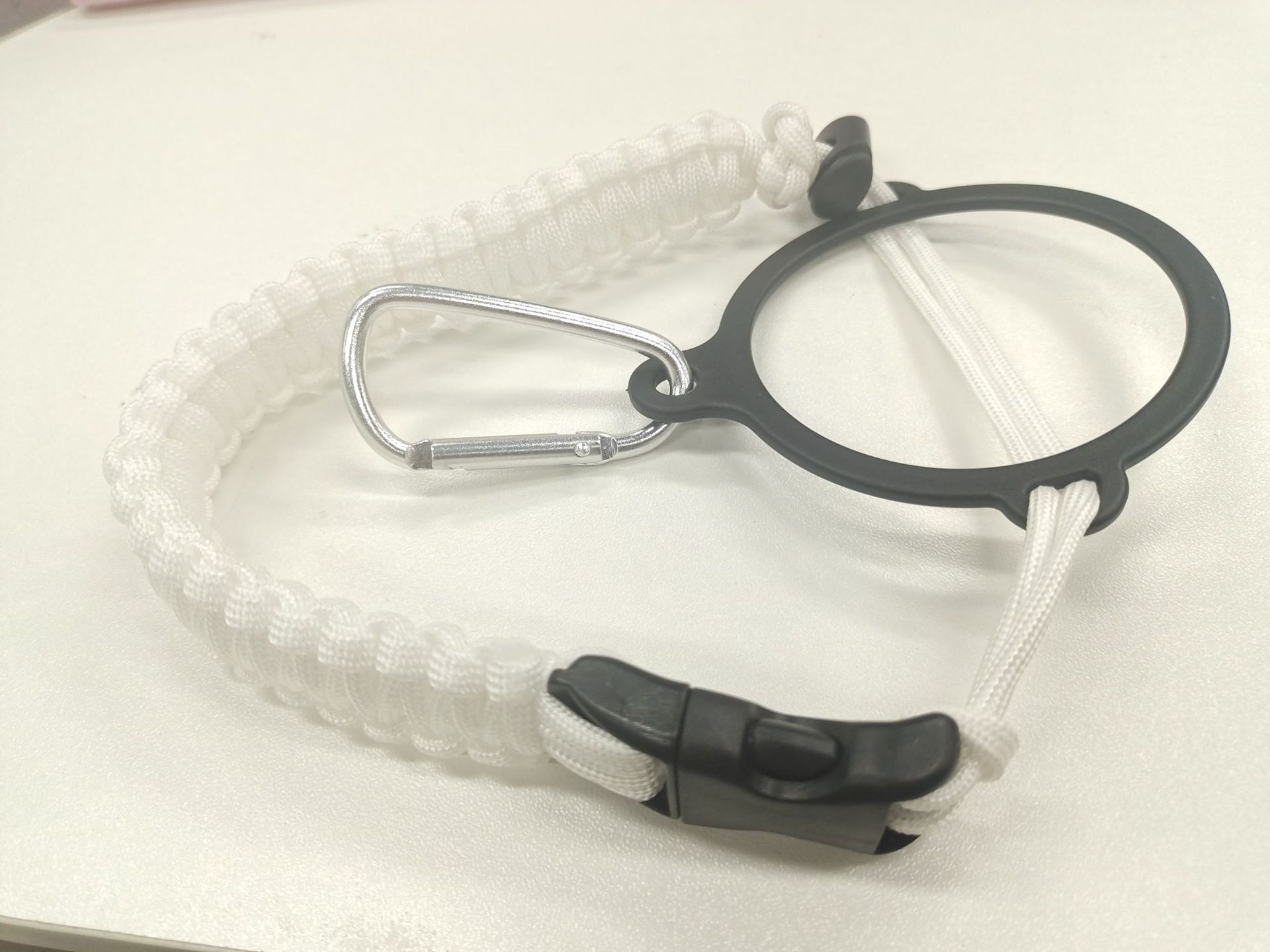 Deportes al aire libre multi-funcional de siete núcleos paraguas cuerda tejida hervidor mango ciclismo montañismo camping hervidor portátil mango