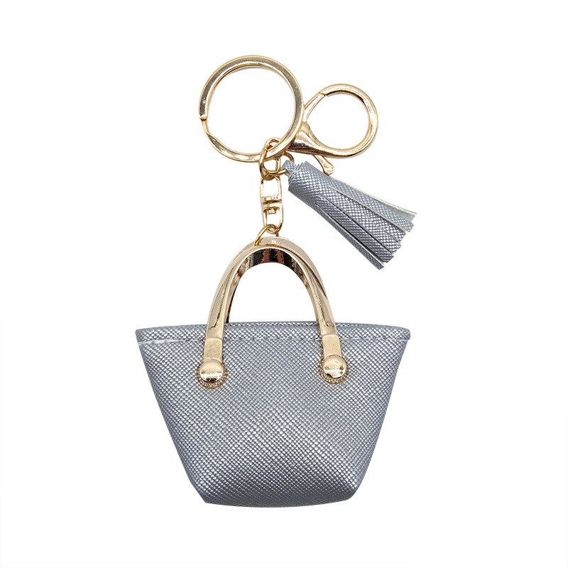 Llavero para mujer, bolso, colgante, joyería, mini monedero de almacenamiento de cuero lindo europeo y americano