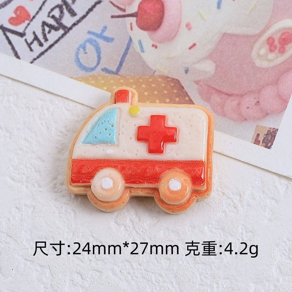 漫画の掘削機のビスケットの食事はdiyクリームゴムの樹脂の小さい部品の穴の靴のボタンのアクセサリーの材料を遊んで卸売りを包みます。