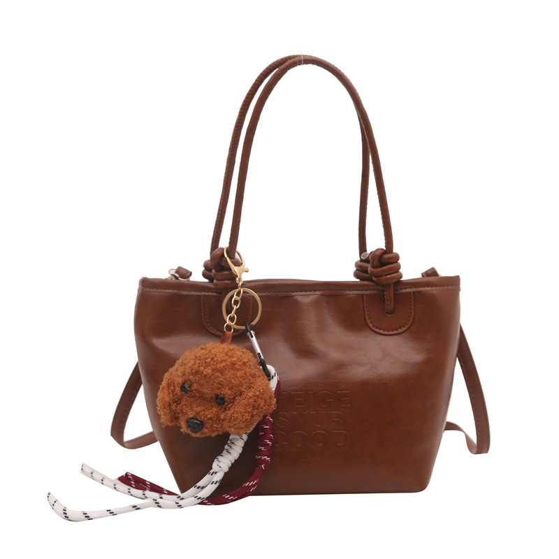 Estilo occidental retro pequeño bolso femenino 2024 nuevo otoño e invierno bolso de mensajero literario de moda bolso de cubo portátil de moda