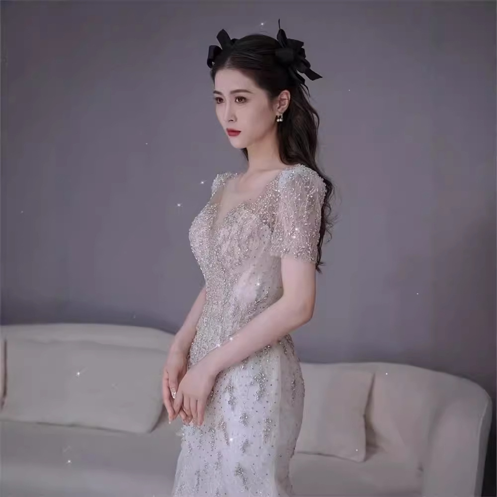 Nuevo vestido de novia estilo sirena francés 2026 con cola para bodas transfronterizas, con una elegancia súper mágica para la novia.