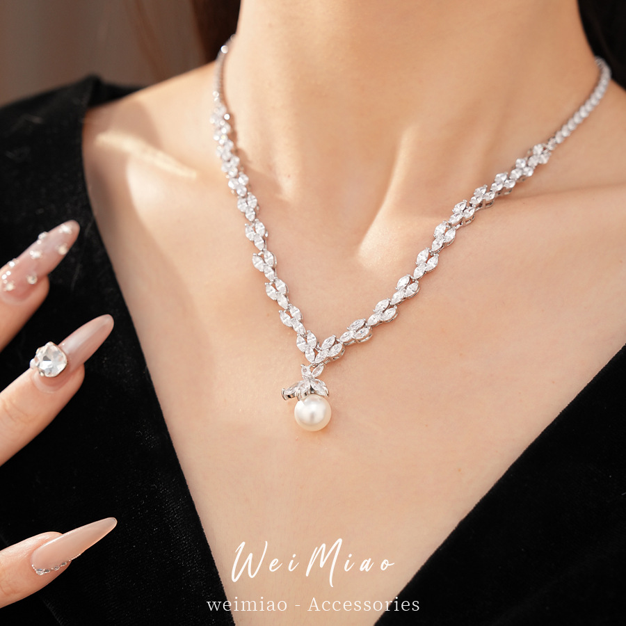 Collar de perlas de zircón ligero de lujo nicho clavícula personalidad exquisita moda alta sensación conjunto de joyería al por mayor