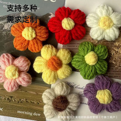 手作りのかぎ針の泡の花の毛糸の花のDIYのヘアピンのアクセサリーの胸の花の包みの服の補助材料の花