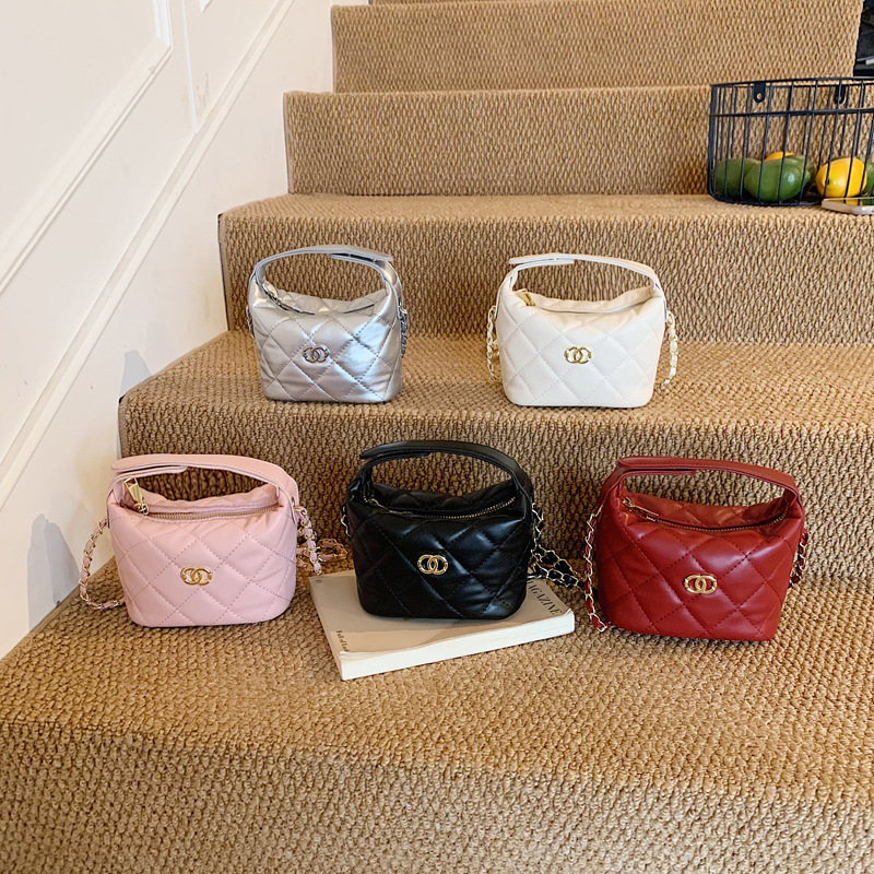 Bolsa de hombro de moda coreana para hombres y mujeres, bolsas de almuerzo de cadena simple para bebés de color sólido 2026 nuevas bolsas para niños