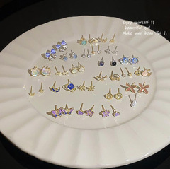 925銀針の精巧な蝶結びのセットのイヤリングの女性ins風の高級なデザイン感の気質のネットの赤い耳のアクセサリーの卸売り