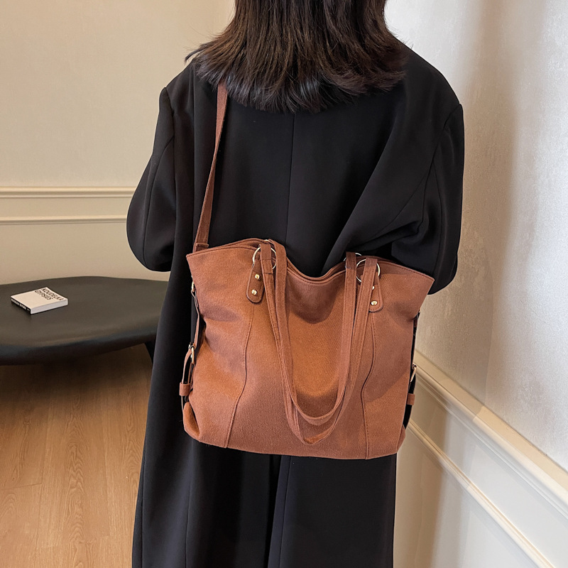 Bolso de gran capacidad de textura de comercio exterior para mujeres 2024 nueva moda retro viaje al trabajo bolsa de hombro mochila