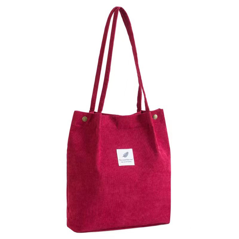 Versión coreana del bolso de lona de pana, bolso de almacenamiento portátil, bolso femenino, bolso de hombro de todo fósforo literario de gran capacidad, spot femenino al por mayor
