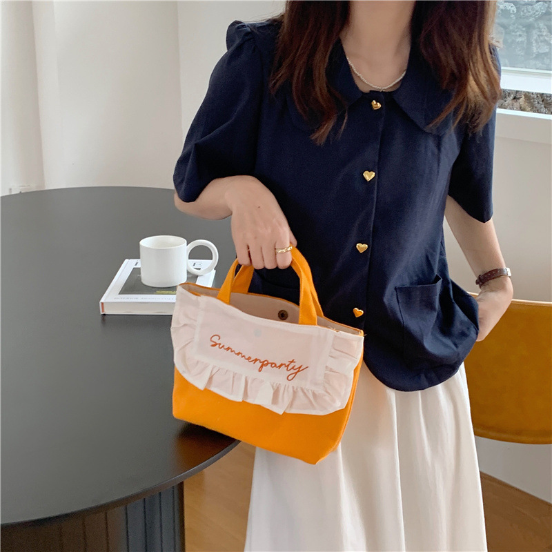 1441 Japanese and Korean chic Sweet ruffled bento Bag, Fresh embroidered hand-held small cloth bag, girl student bag wholesale undefined