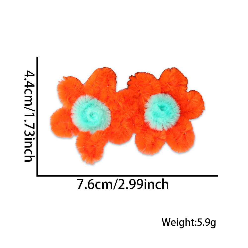 2 pinzas de pelo de naranja (individual)