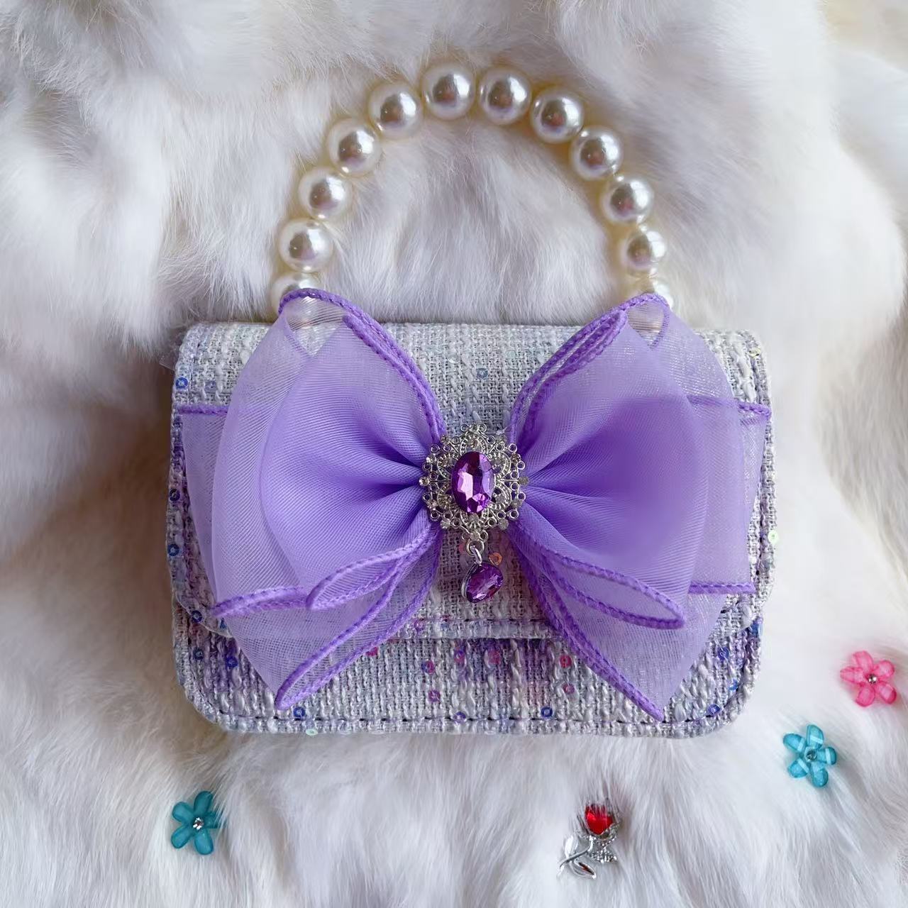 Nuevo tipo de bolsos para niños, bolsos de moda, bolsos de princesa de viento, bolsos portátiles lindos para chicas, bolsos de red para bebés.