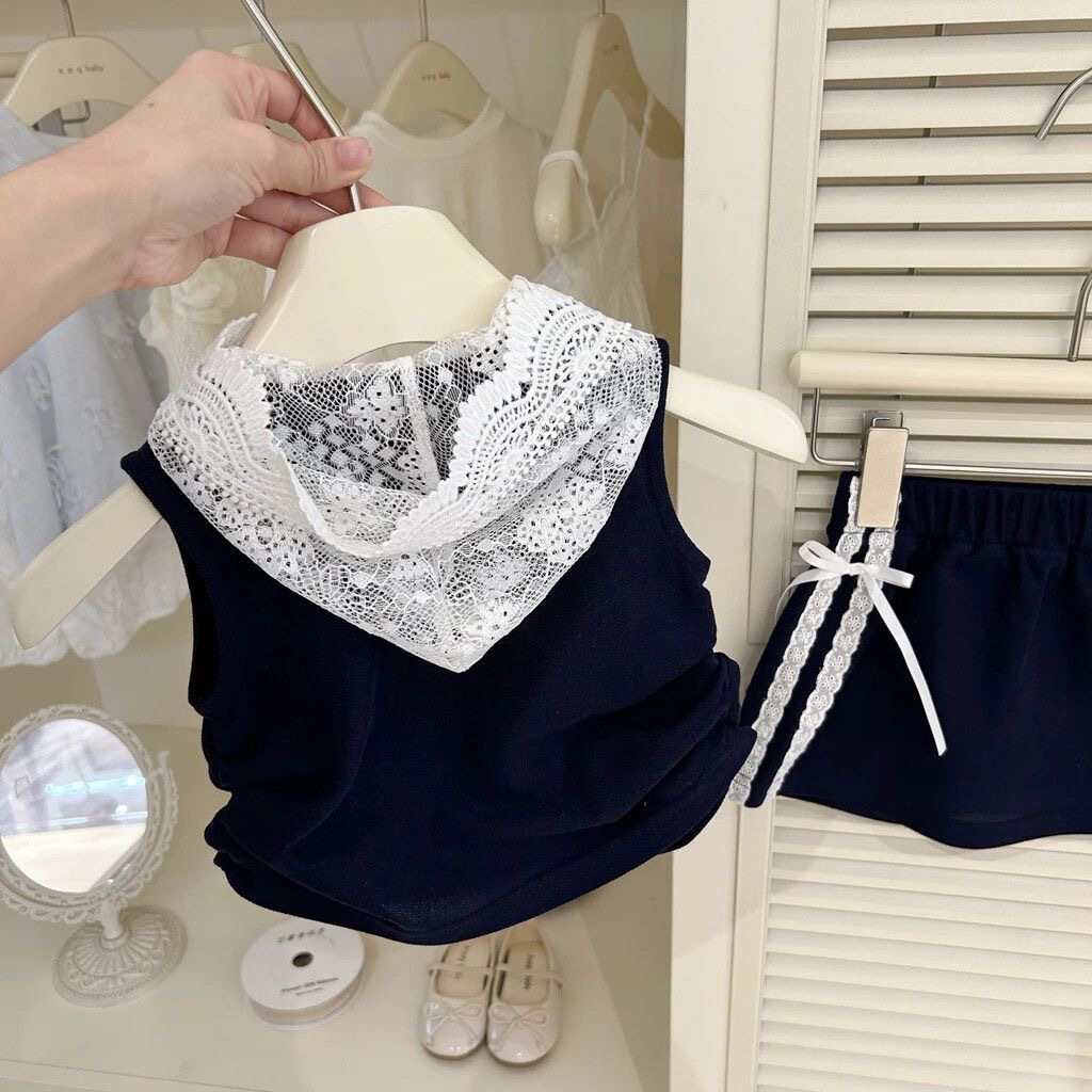 Bebé niñas nuevo conjunto de estilo extranjero de verano 2025 nuevo chaleco sin mangas de moda de la escuela dos piezas de falda