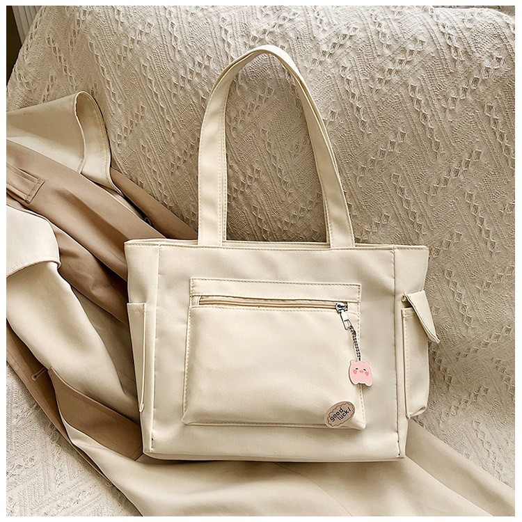 Bolso de tela de vela perezosa, color sólido, pequeño y fresco, estudiante universitario, viaje en clase, bolso de gran capacidad, bolso de hombro