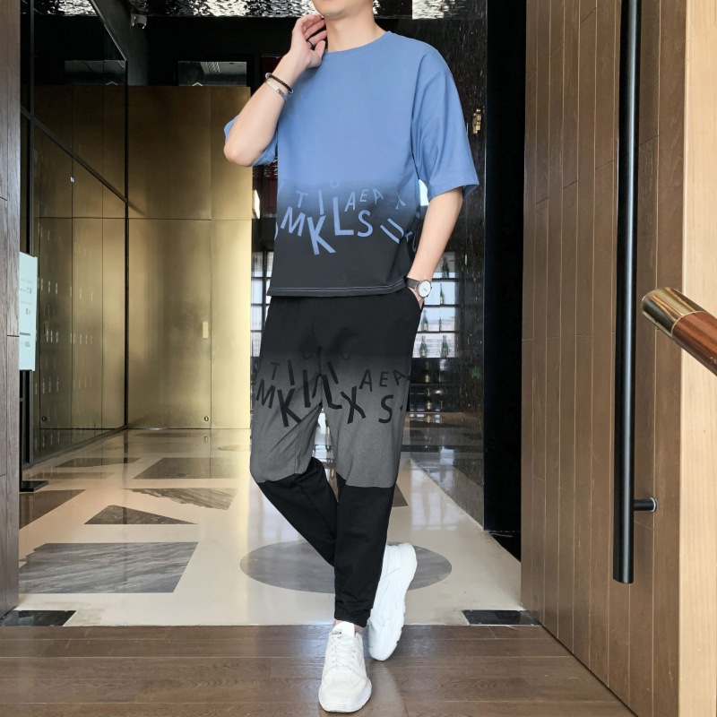 Dispositivo de deporte casual de hombre marca de moda camiseta de cuello redondo manga corta versión suelta de dos piezas conjunto de pies nueve puntos