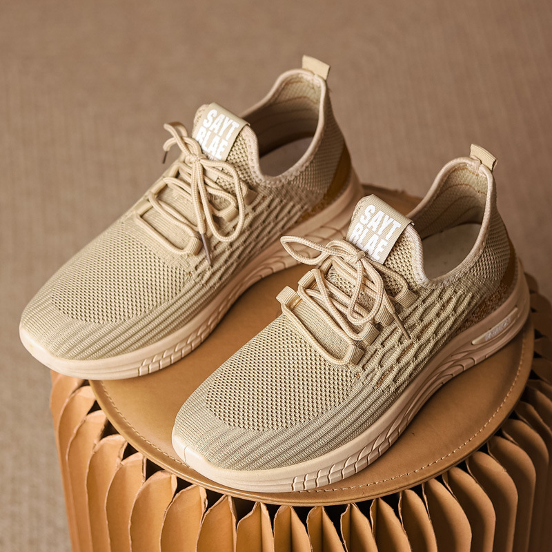 Nuevos zapatos de hombre transfronterizos primavera y otoño transpirables delgados deportes ociosos para correr tejido anti-deslizante hueco zapatos de moda comercio exterior