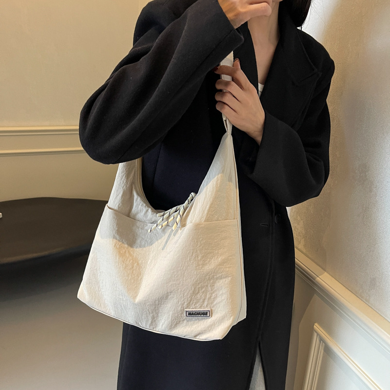 Bolso Tote de todo fósforo de moda para mujer 2024 nuevo bolso de hombro coreano popular de este año bolso de clase de gran capacidad para estudiantes universitarios