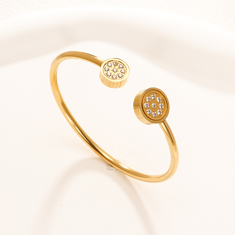 Fábrica en stock al por mayor de Europa y América transfronteriza de acero inoxidable en forma de C pulsera abierta ajustable chapado en oro 18K personalidad no se desvanece