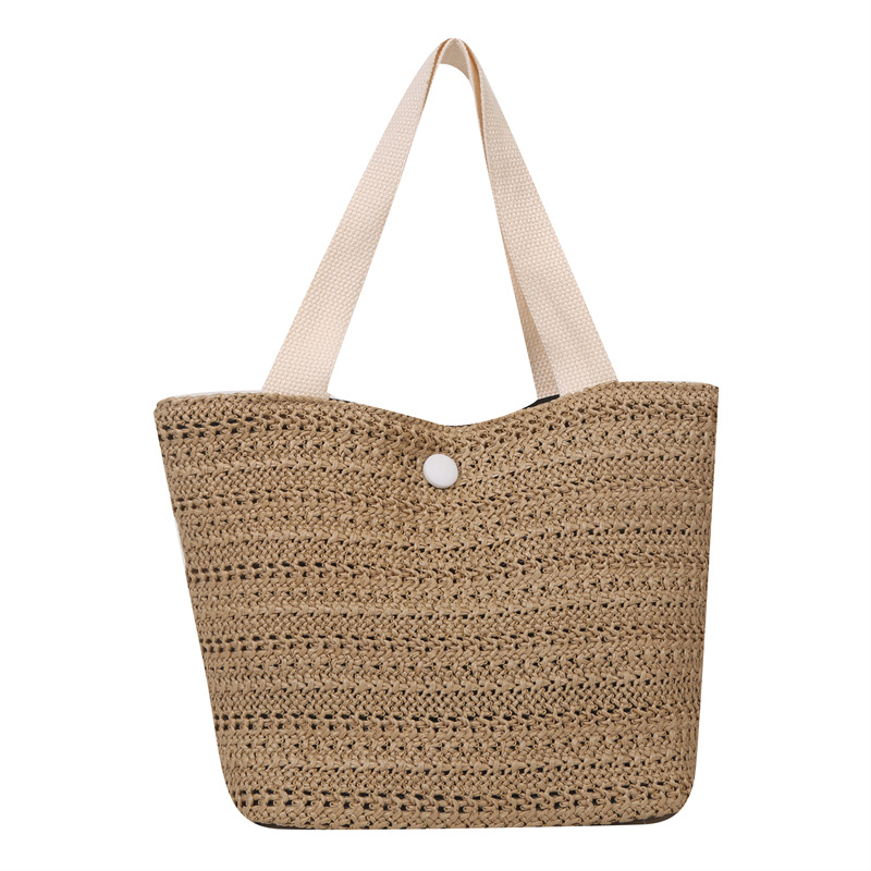 Paja tejida de gran capacidad temperamento bolsas de mano de verano 2024 nueva bolsa de ocio de estilo extranjero este año popular bolsas de cubo de hombro