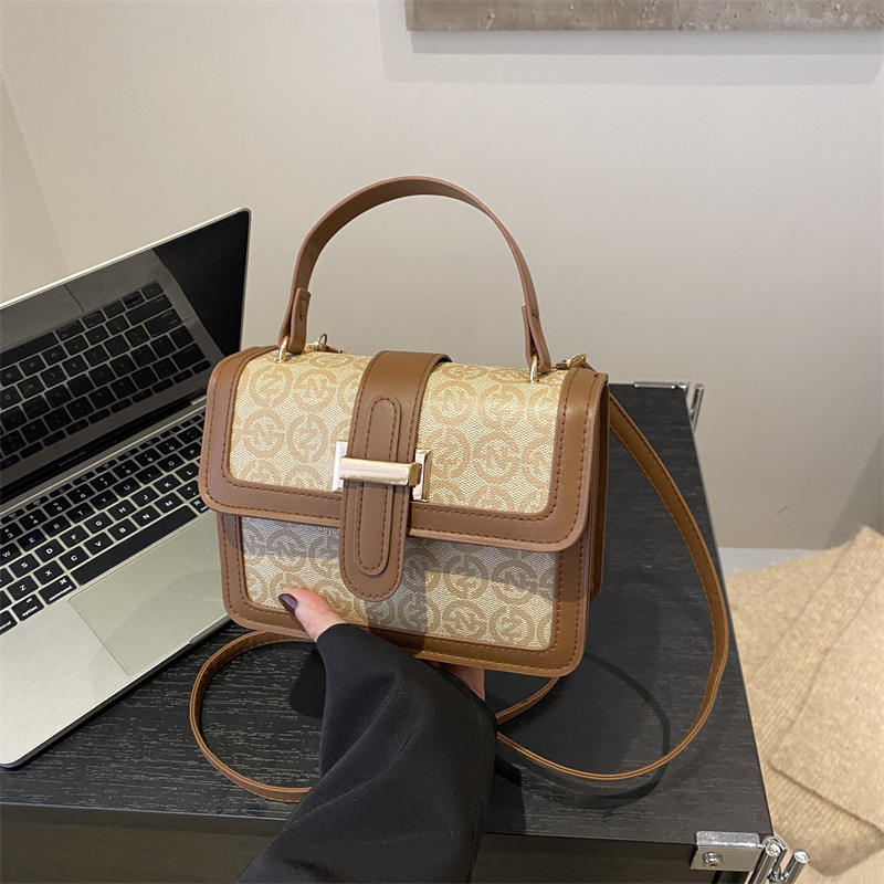 Bolsa de mano de moda coreana de moda 2025, primavera nueva bolsa de hombro de viaje de moda retro impresión mochila