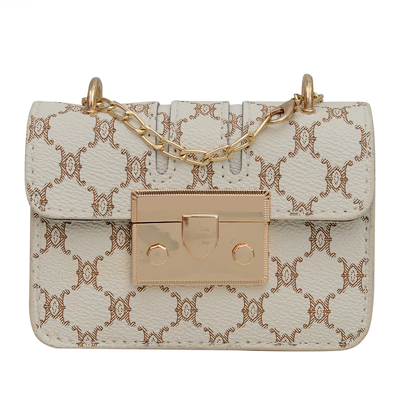 Commuting mini lápiz labial bolso de mano primavera y verano 2023 nueva cadena de moda bolso de hombro impresión retrógrada oblicuo bolso de tendencia