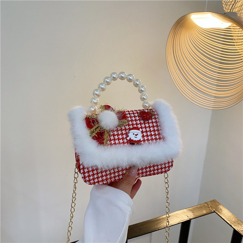 Mini moda para niñas bolso de cambio de perlas 2024 nuevo patrón de moda coreana bolso de ropa infantil