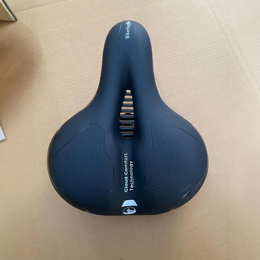 Cross-border mountain bike saddle middle hole cushion with USB charging tail light bicycle shock-absorbing ball with tail light car seat