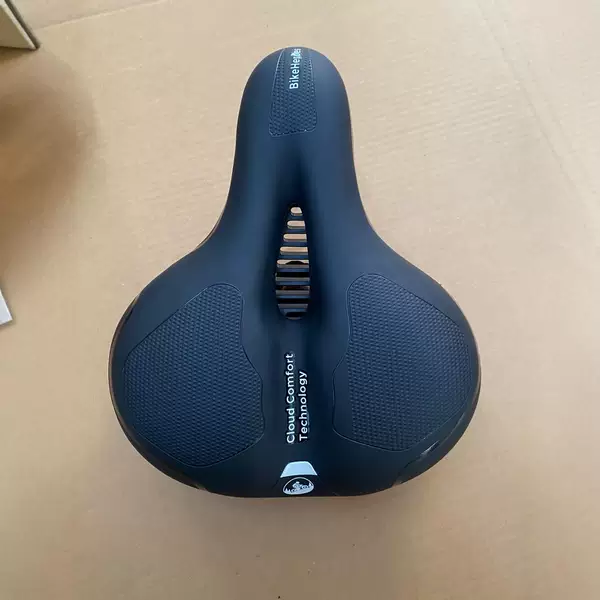 Cross-border mountain bike saddle middle hole cushion with USB charging tail light bicycle shock-absorbing ball with tail light car seat