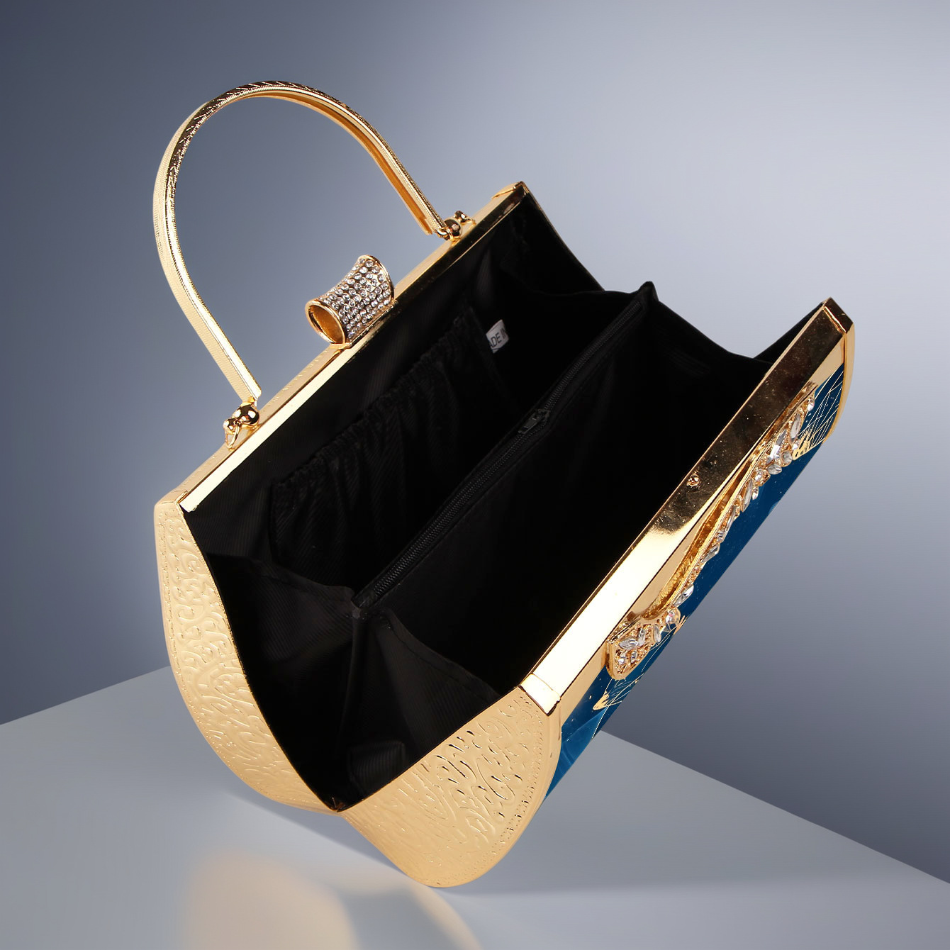 Pochette da sera elegante smeraldo con motivi floreali oro_voghion.com