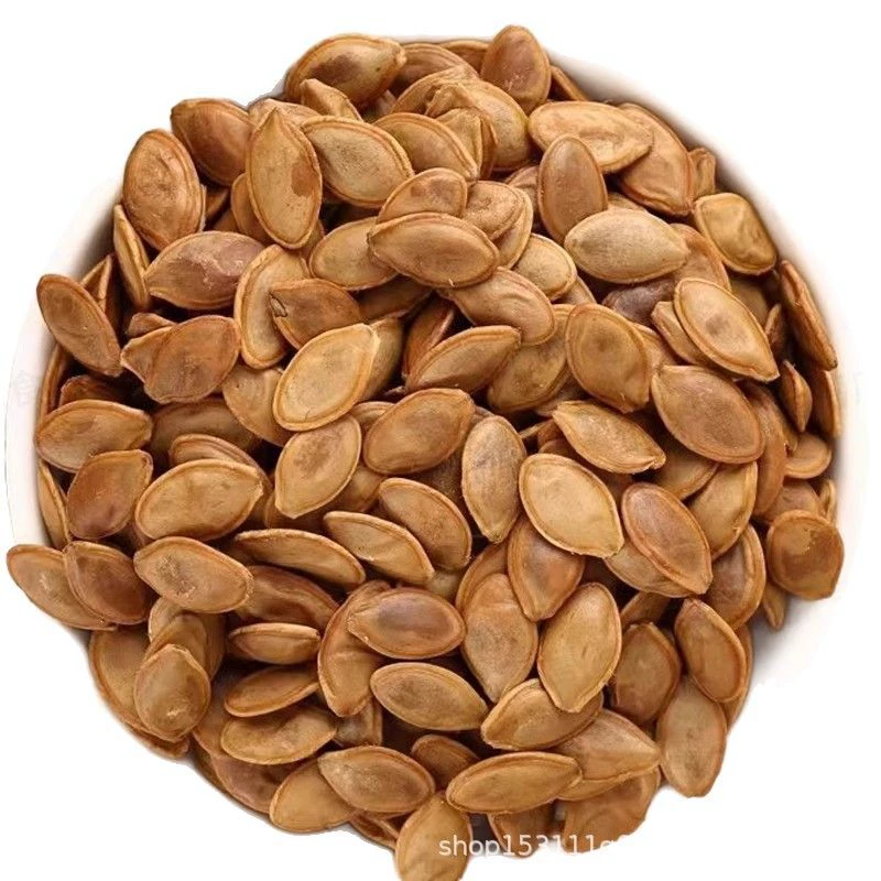 Крупные ломтики сырых/вареных тыквенных семян? Но текст: "Large slices of pumpkin seeds braised 500g*5 bags of tea and drink party vacuum packing Hum Deli boiled marinade wet pumpkin seeds"