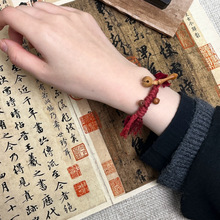 真桃木护身小木鱼手绳手工编织红色手绳手圈桃核铃铛男女同款手链