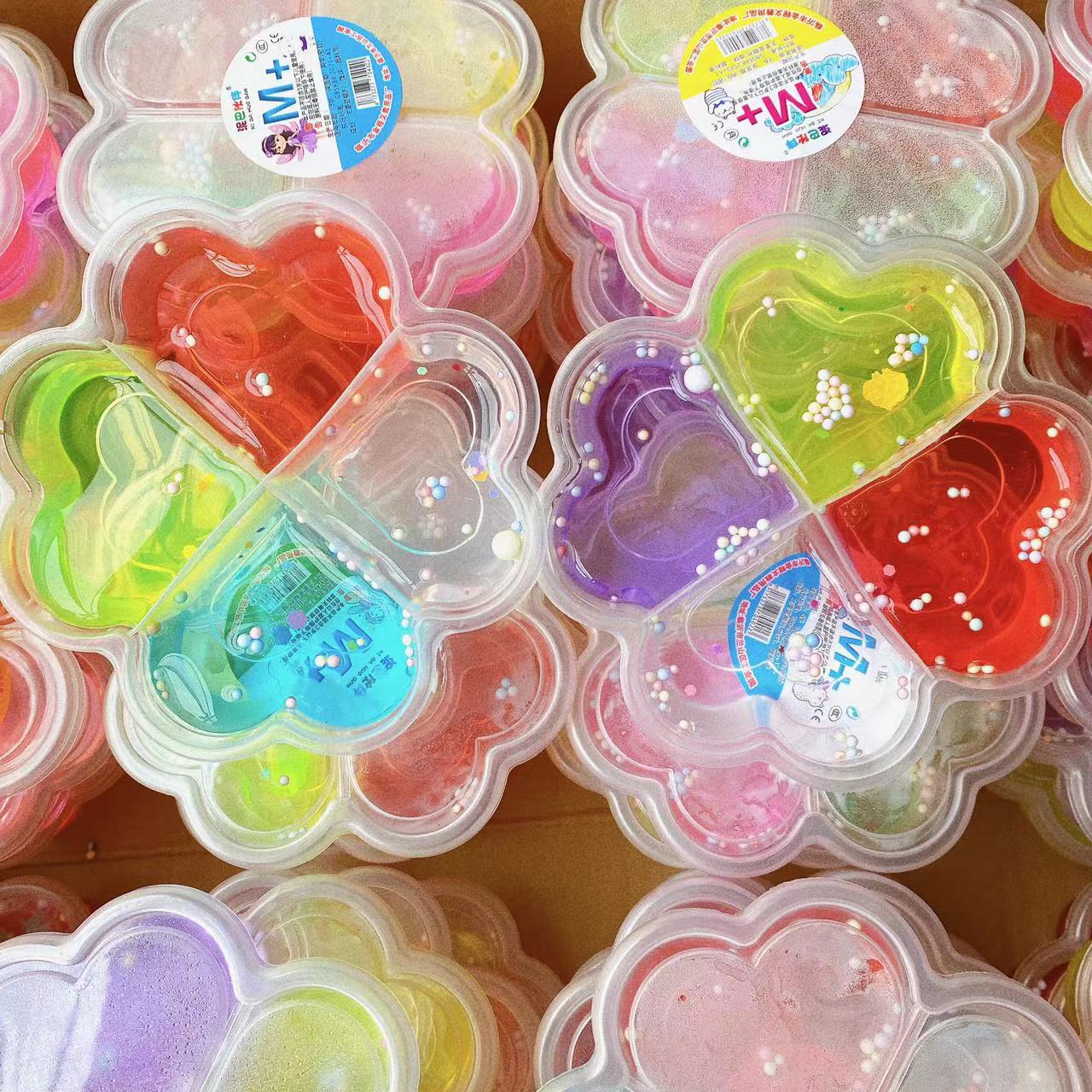 Barro de cristal de cuatro hojas de barro de cristal de ciencia y educación goma espumante slime 4 colores para niños diy alta transparencia 4 cuadros 2 yuanes lotes de departamentos