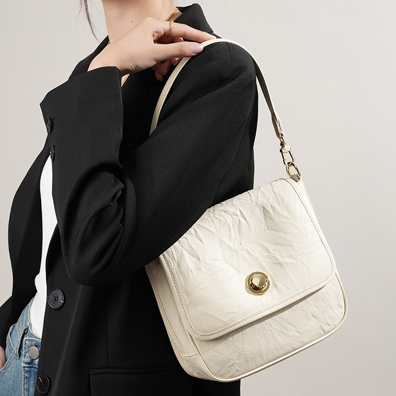 2023 New Hand Grab Pattern Cowhide Underarm for Women High Grade Pleated Black Tote Cross Shoulder Bag_voghion.com