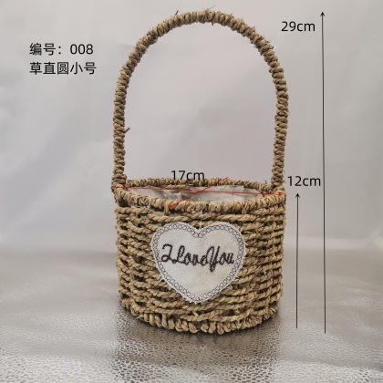 Fabricantes de cestas de flores ovales rectas de paja hechas a mano en stock al por mayor cestas de flores de paja portátiles decoración de viento pastoral